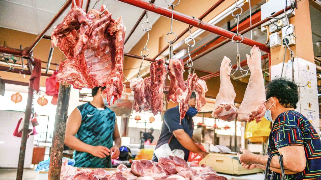 生猪价新高 消费力减弱 猪肉商贩叹吃不消