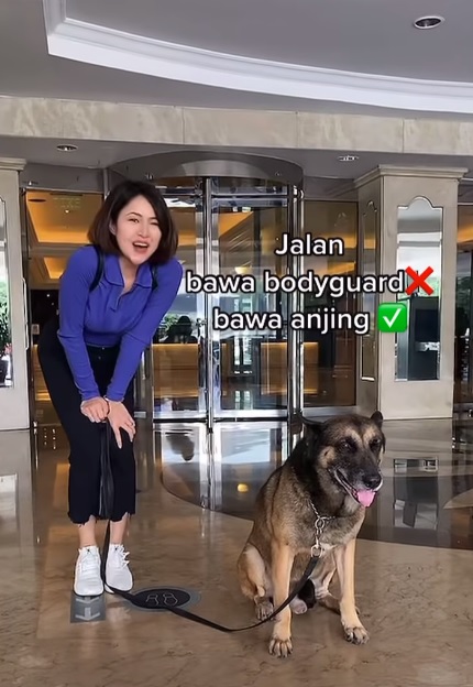 视频|与狗合照被非议 马来女星：“善待动物有什么问题？”
