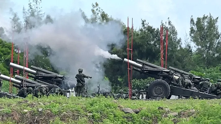 Taiwan holds military drill after China repeats threats