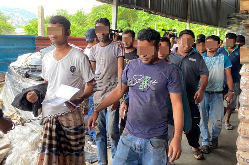 槟州移民局突击2工厂 捕45非法外劳