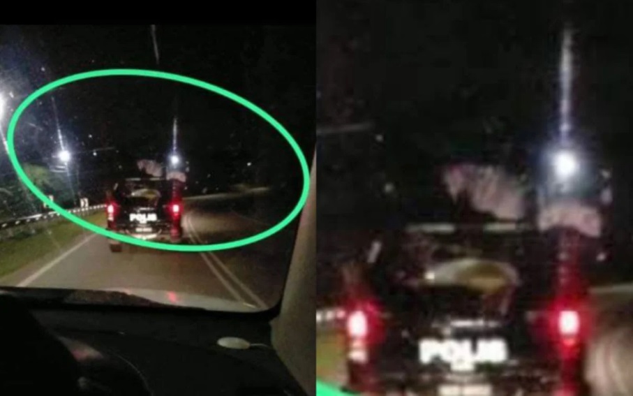 警车车顶出现白色不明物体 网调侃：“幽灵”在搭顺风车！