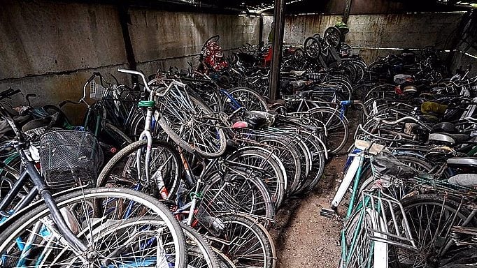In Ukraine’s south, bicycles wait for their owners’ return