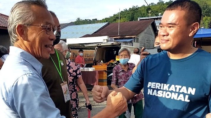 Candidates meet, and greet one another, in Bentong market