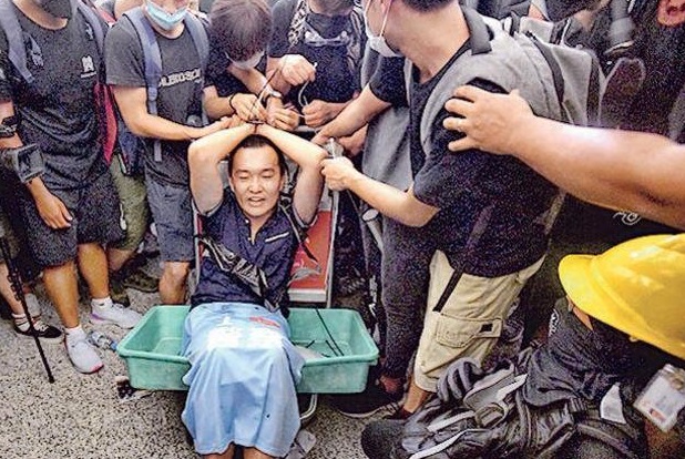 曾遭示威者捆绑殴打 环时前记者付国豪病逝