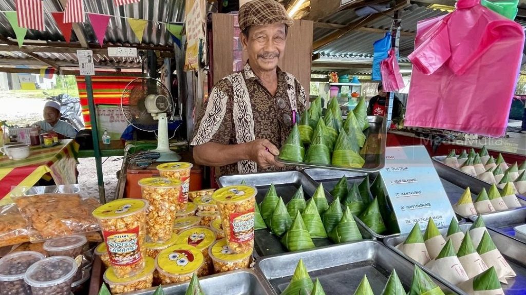 坚持薄利多销 椰浆饭每包卖RM1 善心小贩：没想过要涨价