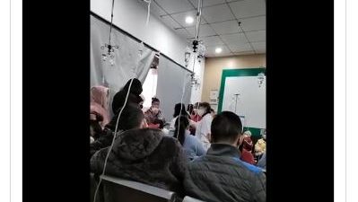 中国防疫放宽新增病例降 发烧病患却挤爆医院