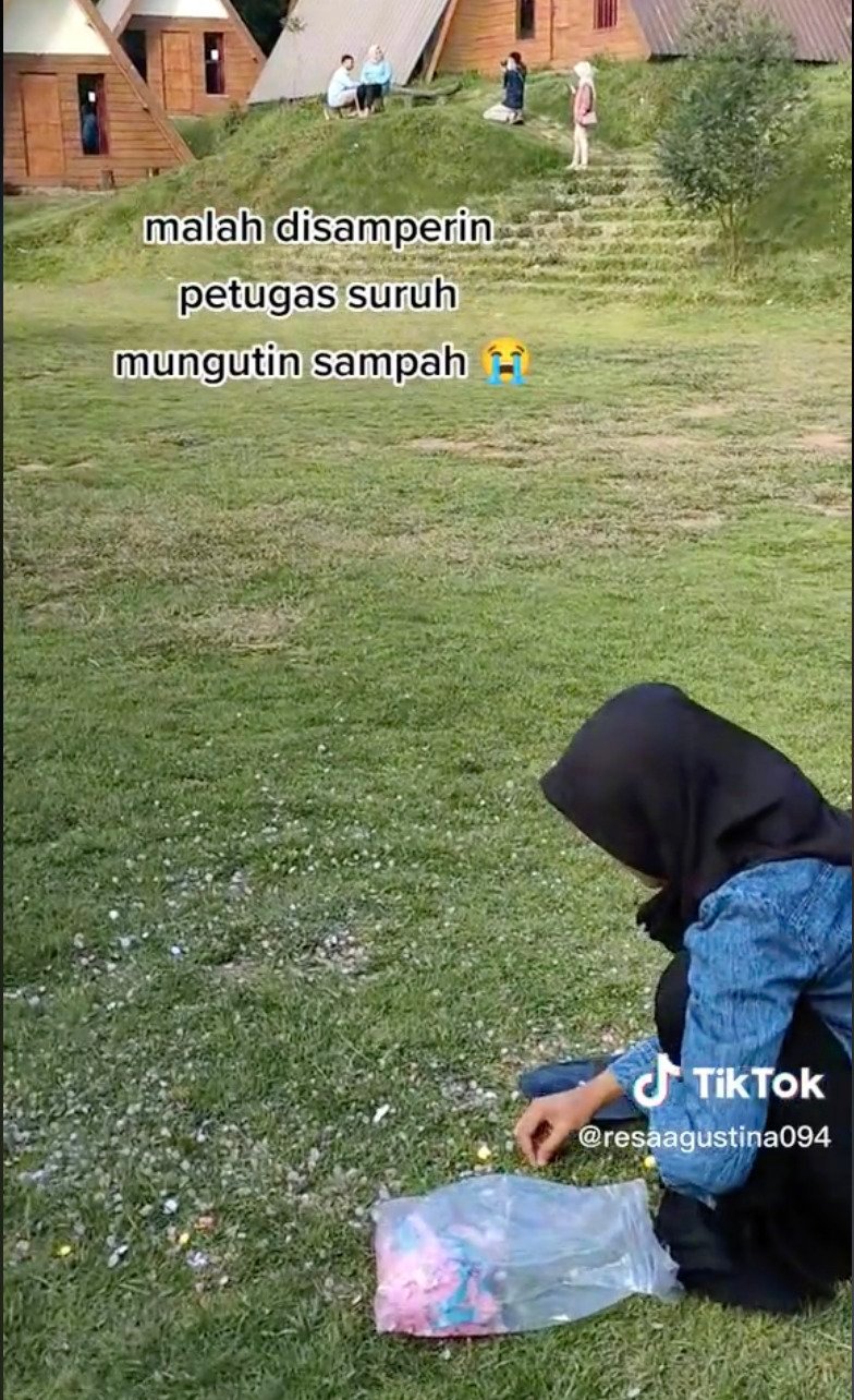 视频|开心怀女娃公园戳气球公告 女子被喝令“捡完碎纸片才回家”