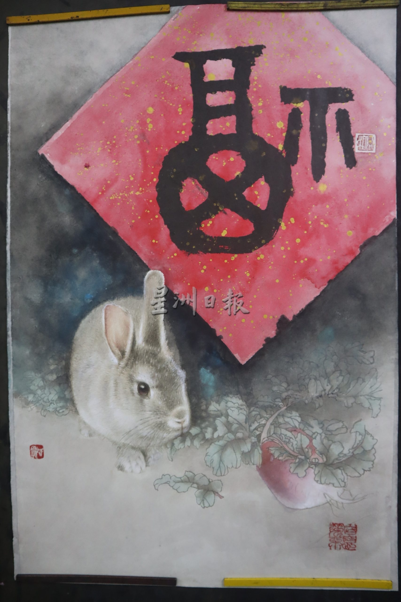 东：新春备稿：水墨画老师黎潮湘受访时披露，画兔子需要注意耳朵部分