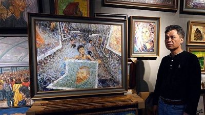 China’s ‘art factory’ painters turn from fakes to originals