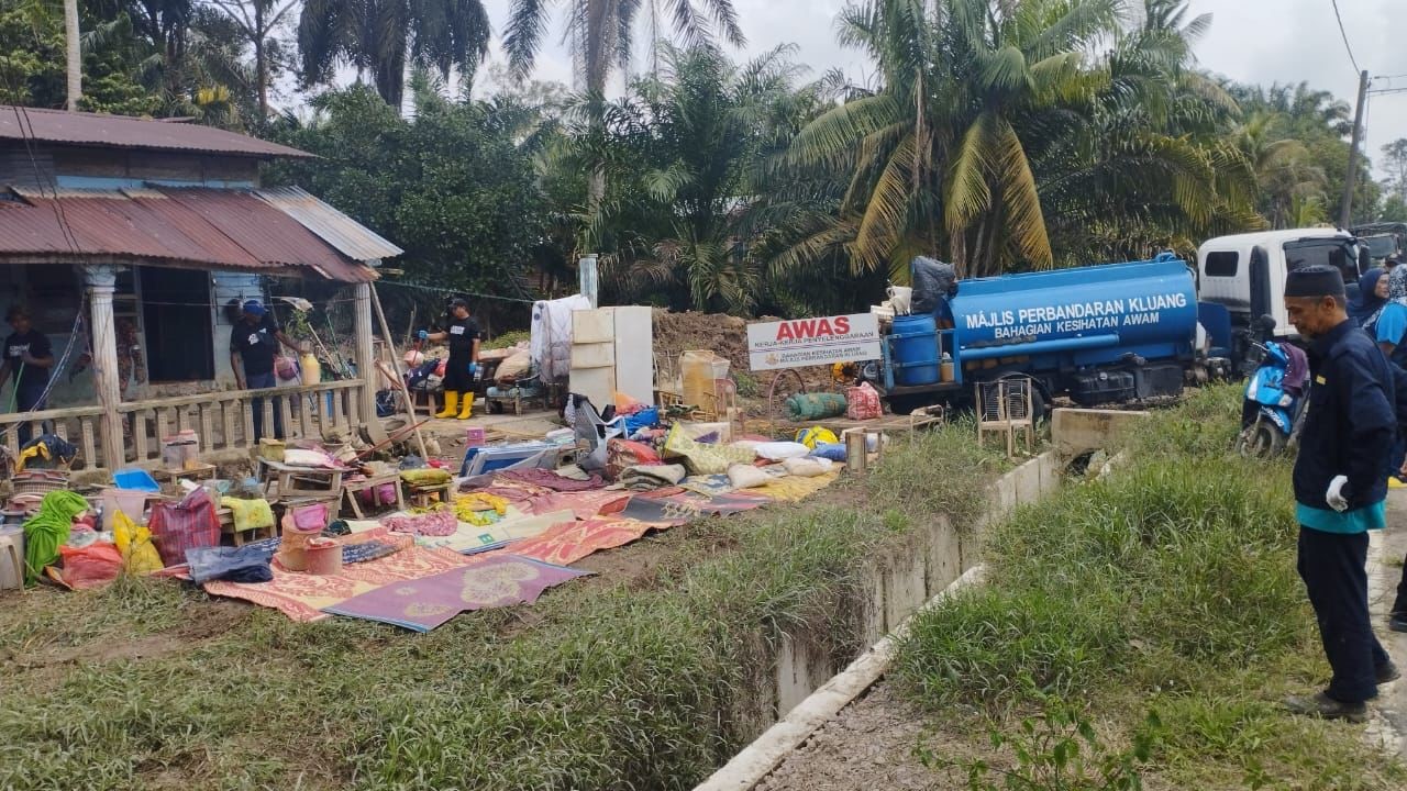 柔：新闻：政府单位协助灾后清理灾黎家园