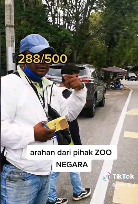 路旁没画格子停车收RM10 外劳：受动物园方指示