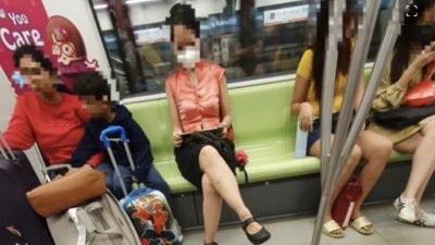 旅客一家大小到狮城旅行 遭女子破口大骂指行李占据地铁车厢空间