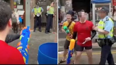 香港庆泼水节淋警 警同日拘两人