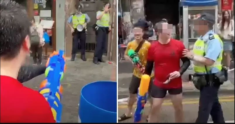 香港庆泼水节淋警 警同日拘两人