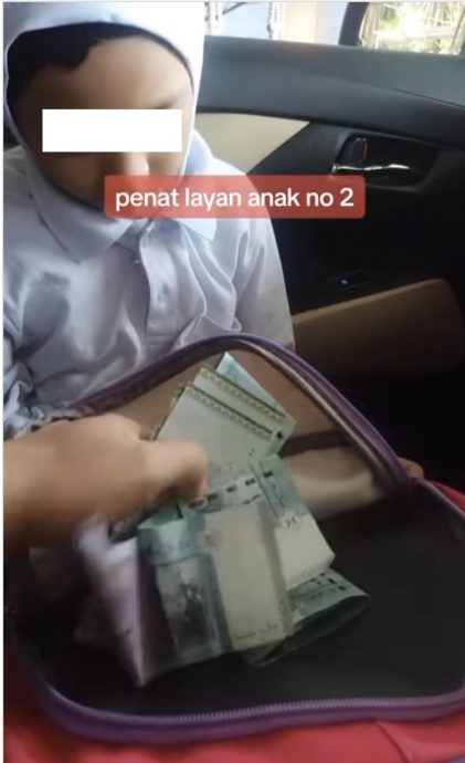 视频|搔破头忘记RM1500放哪儿 “原来女儿拿去帮同学”