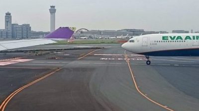 长荣泰航羽田机场擦撞 机上乘客惊: 机翼缺了一截