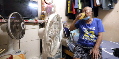 ‘In a sauna’: Hong Kong’s laborers swelter as temperatures rise