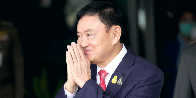 Thai king cuts ex-PM Thaksin’s jail term to one year