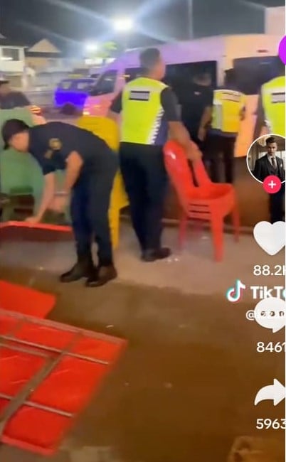 **已签发**柔：巴西古当市政厅执法人员取缔路边摆放桌椅餐馆，遭业者怼上