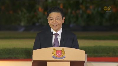 新加坡总理交接  黄循财苦学华语马来语进行总理首演说