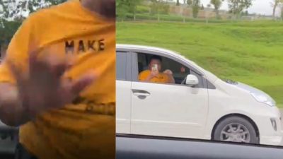 视频 | 2男开车拿手机互拍互骂 停大道旁怒打车窗