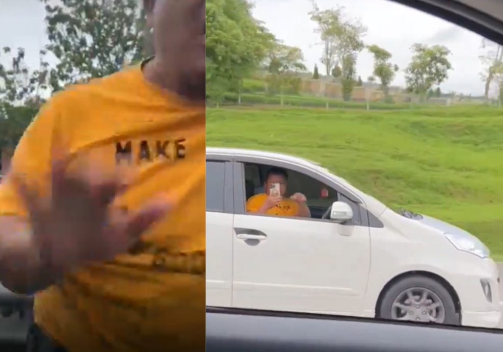 视频 | 2男开车拿手机互拍互骂 停大道旁怒打车窗 