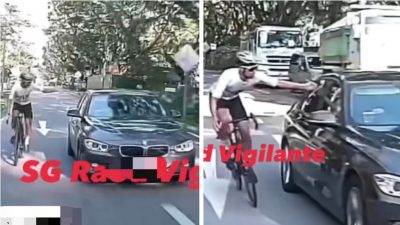 【视频】不满汽车突然换道 脚踏车骑士疾驶敲窗